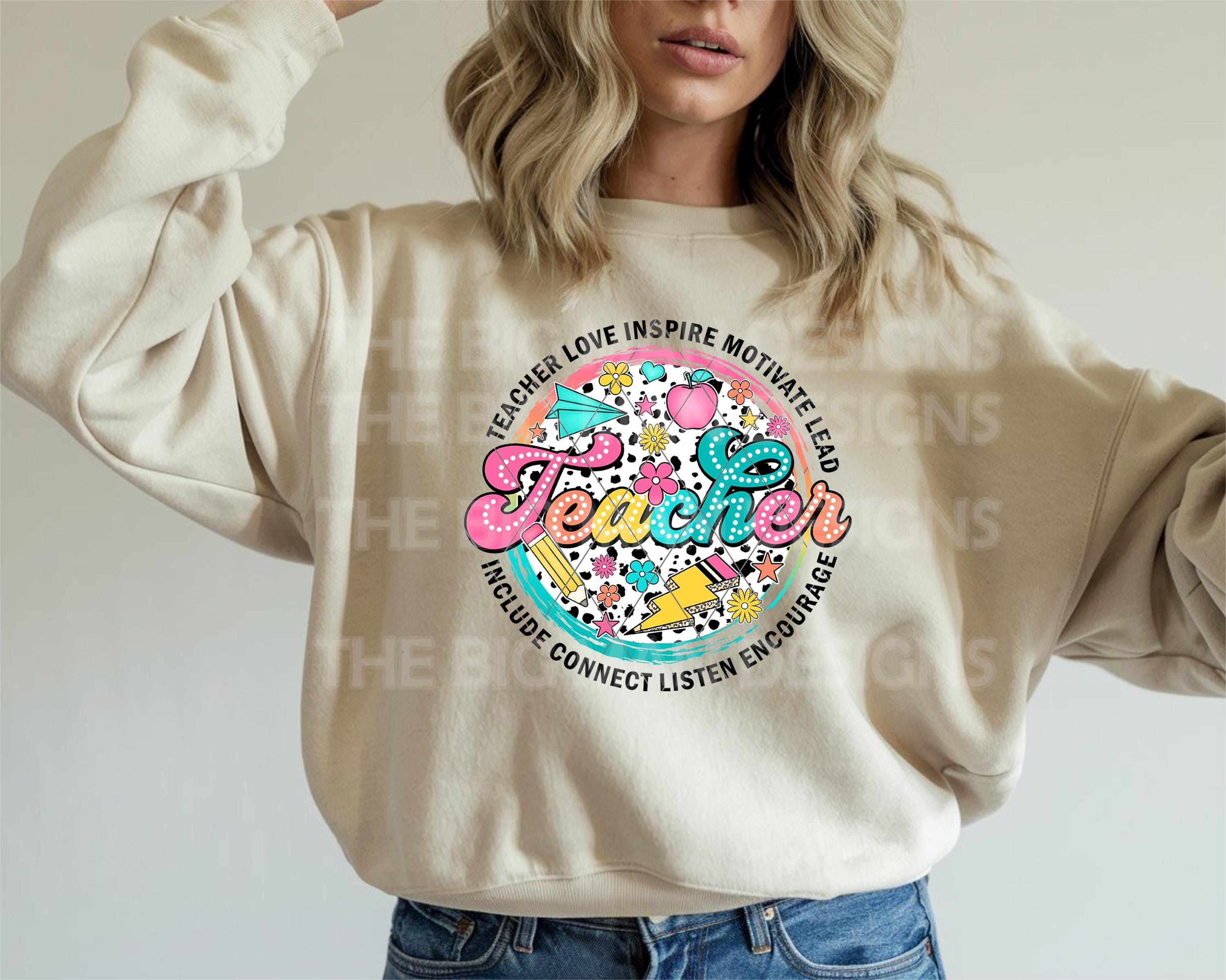 "Teacher love inspire motivate sweatshirt on beige background"