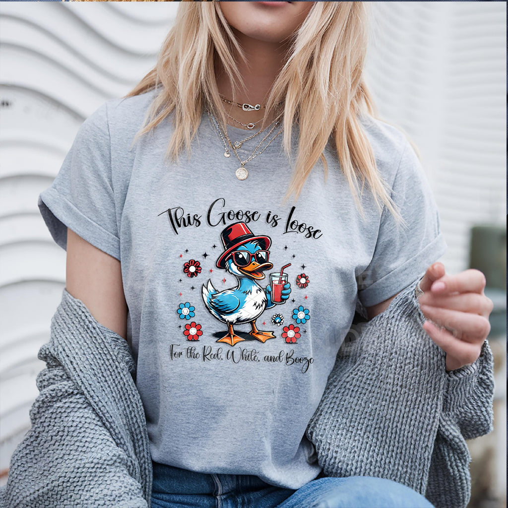 Let the festivities fly with this hilarious “This Goose is Loose for the Red, White, and Booze” DTF Transfer! Featuring a party-ready goose in sunglasses and a top hat sipping a red drink, it’s perfect for making standout shirts this July 4th, Memorial Day, or any red, white, and boozy occasion.