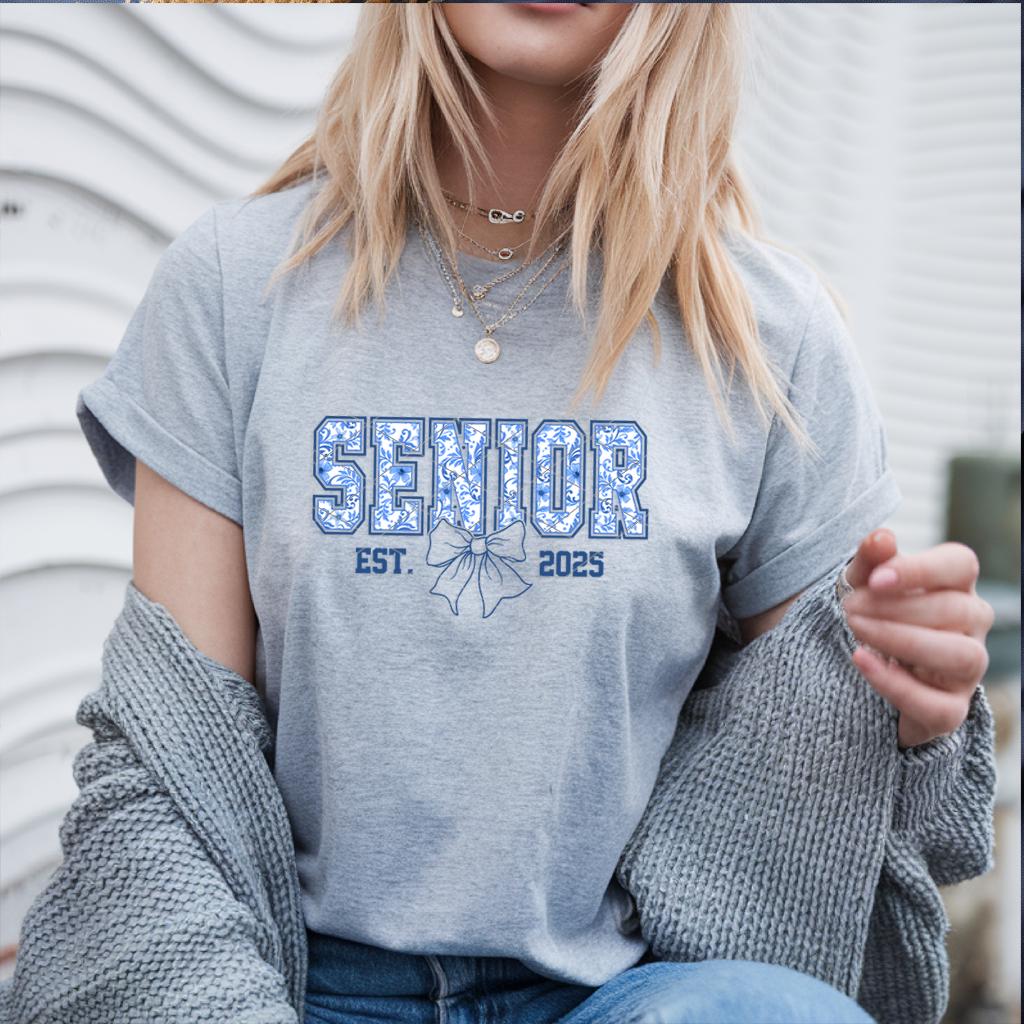 Grey Senior Est. 2025 T-shirt styled with jewelry and cozy sweater.