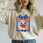 Natural color sweatshirt featuring Patriotic Goose DTF transfer with American flag bow.