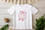 White T-shirt flat lay with Summer Fun Goose design (goose with pink boots and strawberries)