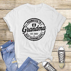 white t-shirt with black "Promoted to Grandma" print.