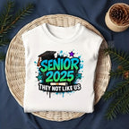 Make a statement with this edgy Senior 2025 – They Not Like Us DTF Transfer! Designed in graffiti-style font with stars, diploma, and graduation cap, this heat transfer is perfect for standout seniors who walk their own path.