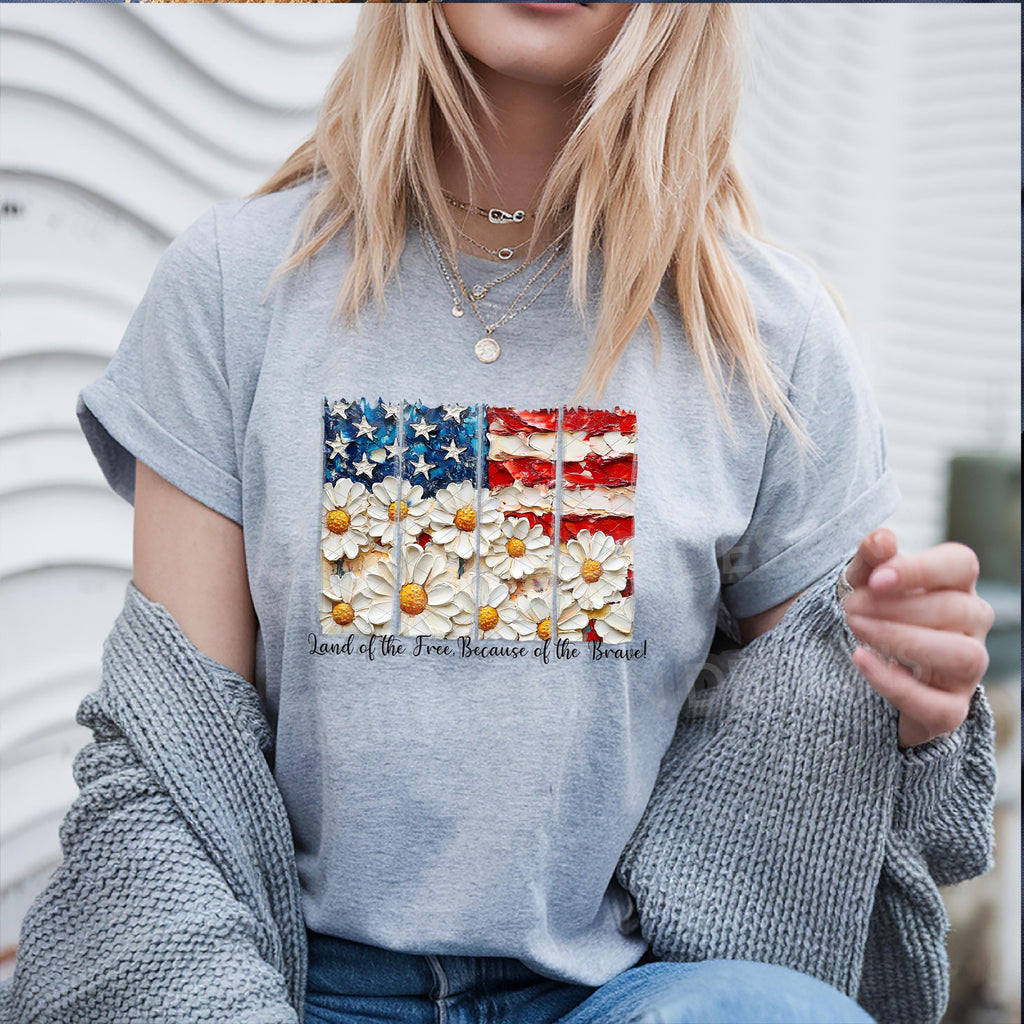 This daisy American flag tee is the perfect blend of soft and strong. Show your gratitude this 4th of July with a shirt that says it all — “Land of the Free, Because of the Brave.”
Available as a tee, sweatshirt, or DTF transfer.
