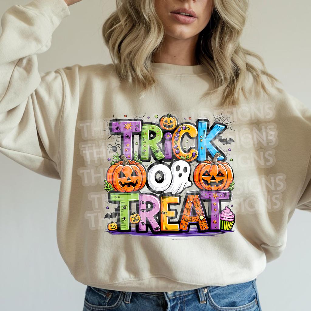 Sand sweatshirt mockup featuring Trick or Treat Halloween DTF transfer