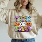 Sand sweatshirt mockup featuring Trick or Treat Halloween DTF transfer