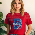 Model wearing red T-shirt with Gators school spirit DTF transfer