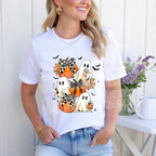 DTF transfer of pumpkin ghosts with bows and bats displayed on white t-shirt mockup