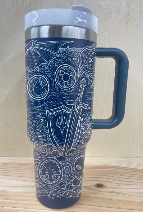 Magic The Gathering images on blue 40 oz tumbler with steel design