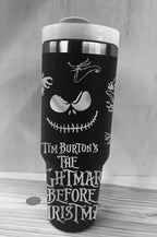 Ooglie Googlie images on black 40 oz tumbler with steel design