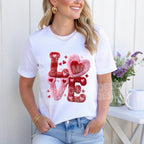 Female model wearing white Valentine LOVE chenille patch style shirt with heart design