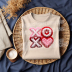 XOXO heart faux chenille patch style DTF transfer on neutral shirt Valentine heat transfer