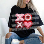 XOXO faux latch hook heart DTF heat transfer on black shirt trendy Valentine apparel design