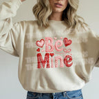 Crochet BE MINE Valentine DTF heat transfer on lifestyle sweatshirt mockup