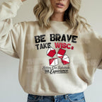 Be Brave Take WISCs on a natural sweatshirt, lifestyle mock up