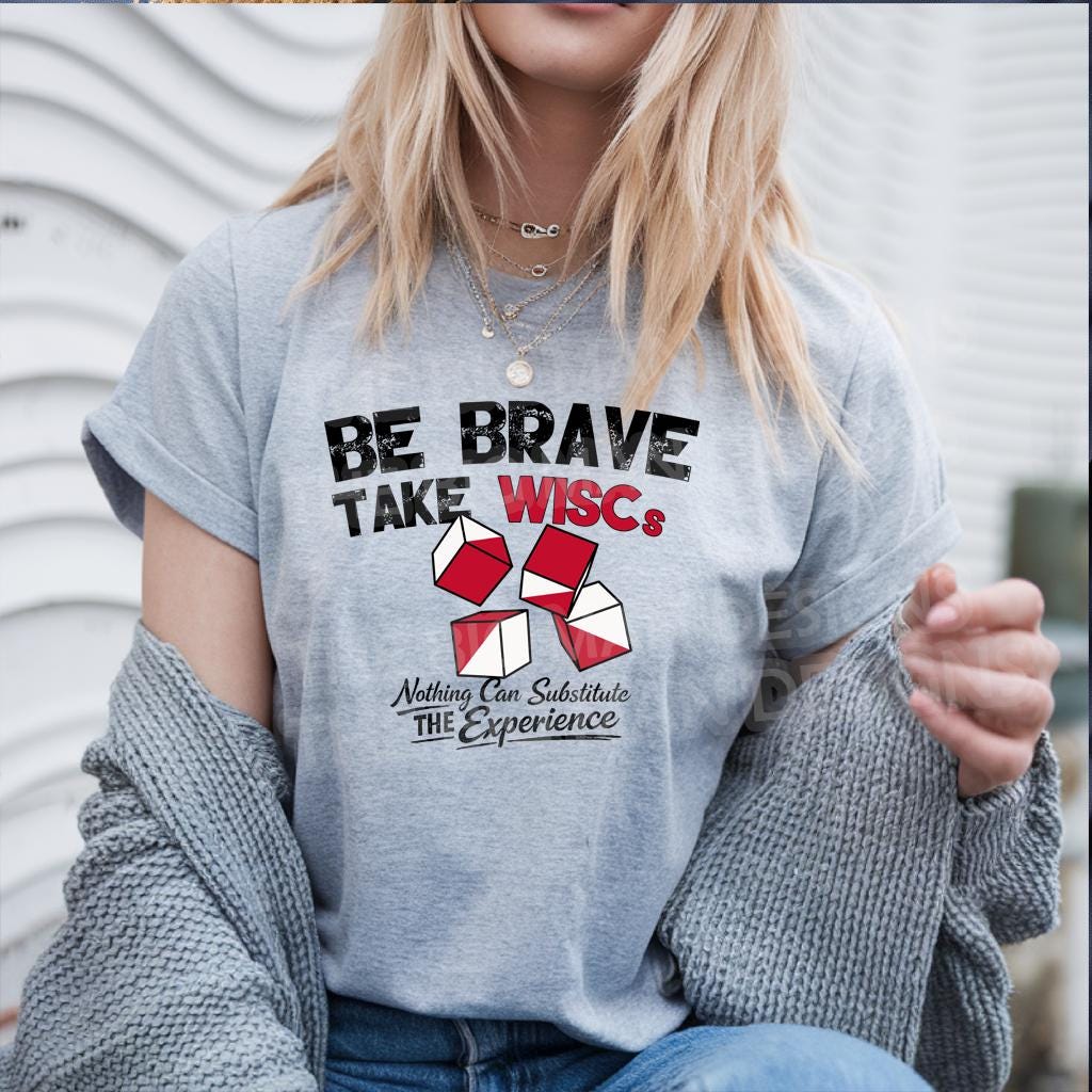 Be Brave Take WISCs black and red writing on a grey tshirt lifestyle mock up