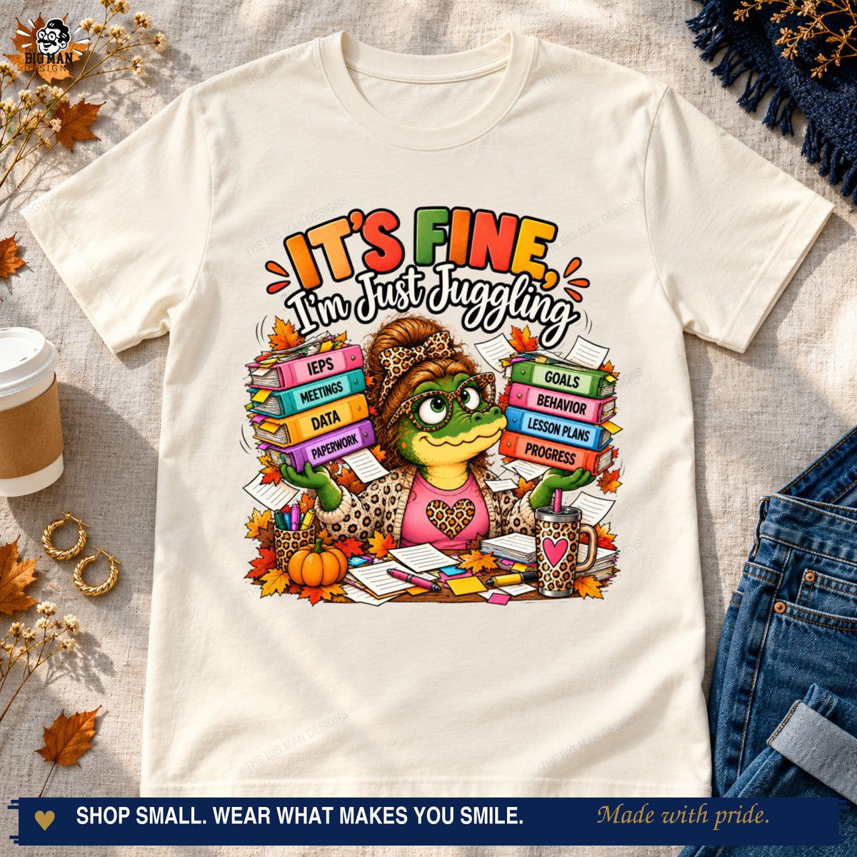 Natural It's Fine I'm Just Juggling T-shirt styled with jeans, coffee, and autumn accents.