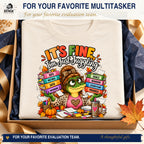 It's Fine I'm Just Juggling shirt styled in a navy and gold gift box for busy educators.