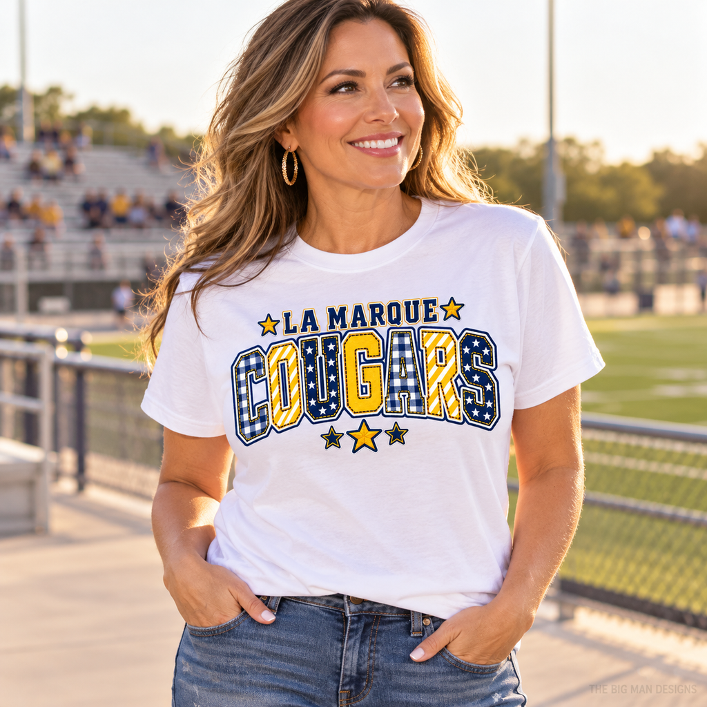 Customer wearing a white La Marque Cougars patchwork varsity school spirit T-shirt.