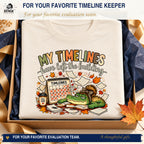 My Timelines Have Left the Building shirt arranged in a navy and gold gift box for educators and evaluation teams.
