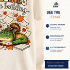 Cropped print detail of timeline lettering, flying paperwork, autumn leaves, and the tired gator on shirt fabric.
