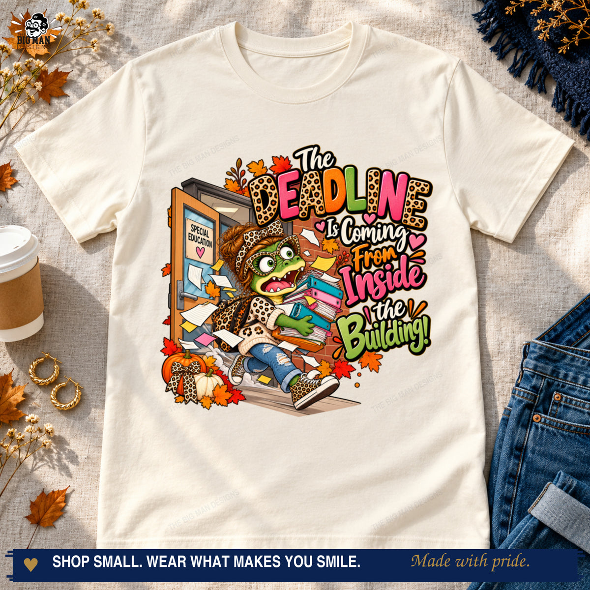 Natural deadline gator T-shirt styled with jeans, coffee, and autumn accents.